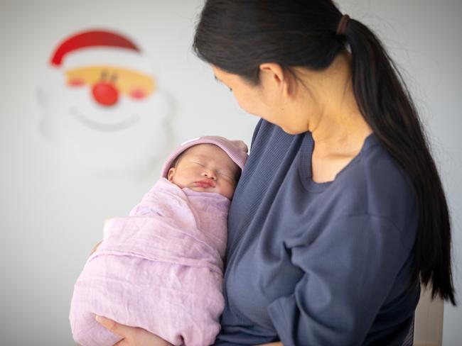 ADELAIDE, SOUTH AUSTRALIA - Advertiser Photos DECEMBER 25, 2024: Serena Huynh with the first Christmas baby Kamila born three minutes past midnight at the WCH, North Adelaide. Picture: Emma Brasier