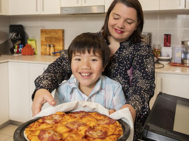 FOR HIBERNATION -  The Joyful Frugalista Serina Bird at home with her son Audie, 8, making pizza. Picture by Sean Davey.