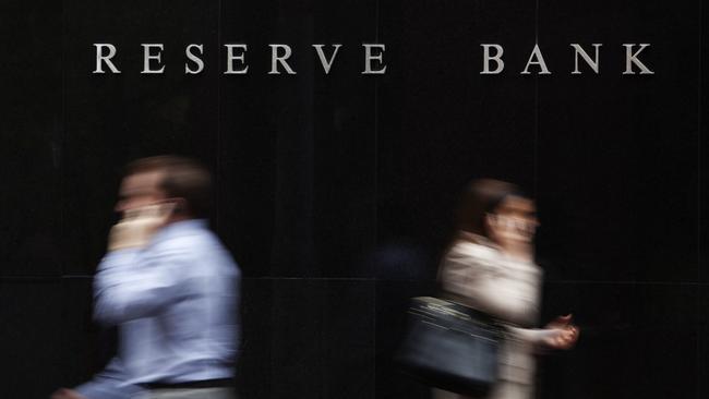 "Sydney, Australia - October 6th, 2011: People walking past the Reserve Bank of Australia in Sydney. The Reserve Bank of Australia conducts monetary policy, commencing operations as Australia\\'s central bank on 14th January 1960."