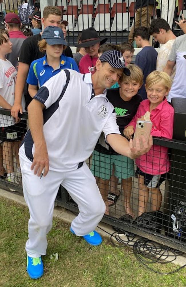 Adam Gilchrist taking selfies with excited fans at Lismore's cricket picnic day at Oakes Oval on Saturday. Picture: Sarah Buckley