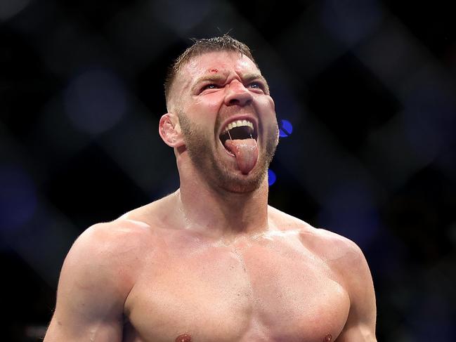 PERTH, AUSTRALIA - AUGUST 18: Dricus Du Plessis of South Africa celebrates winning his fight against Israel Adesanya of Nigeria by submission during UFC 305 at RAC Arena on August 18, 2024 in Perth, Australia. (Photo by Paul Kane/Getty Images)