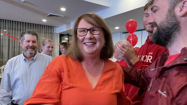 Parramatta Labor candidate Donna Davis enters Rosehill Bowling Club after winning the election.