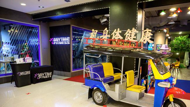 A tuktuk is parked outside a closed fitness centre in Bangkok during partial lockdown measures. Picture: AFP