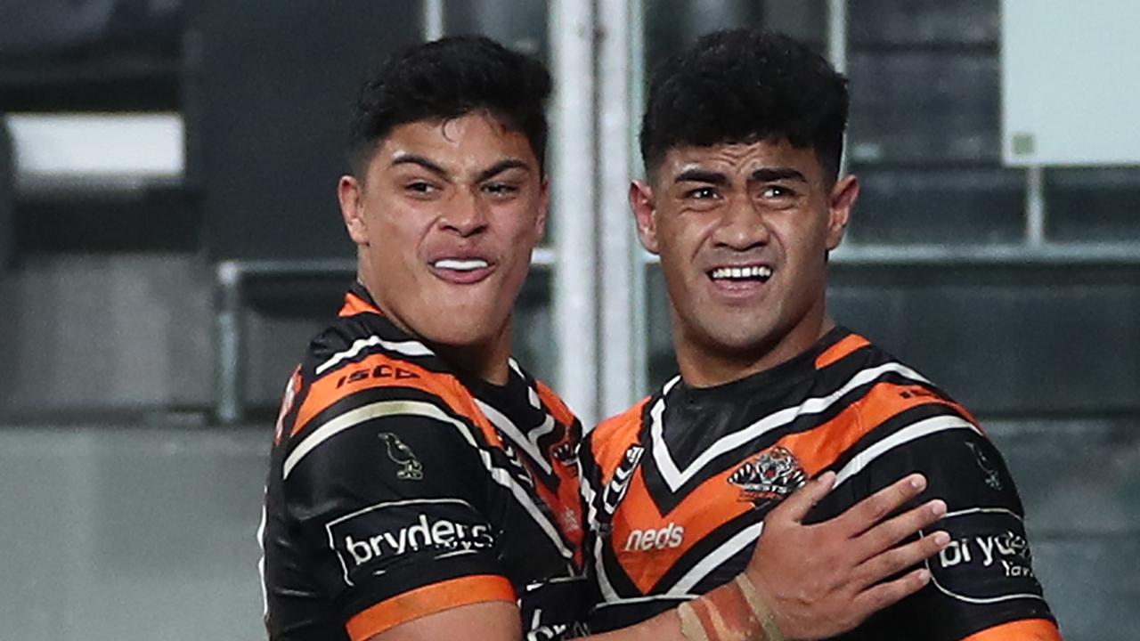 Asu Kepaoa of the Tigers celebrates after scoring a try.