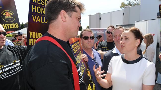 Jane Garrett meets protesting firefighters during the opening of the MFB station at Altona during her time as Emergency Services Minister. Picture: Andrew Henshaw