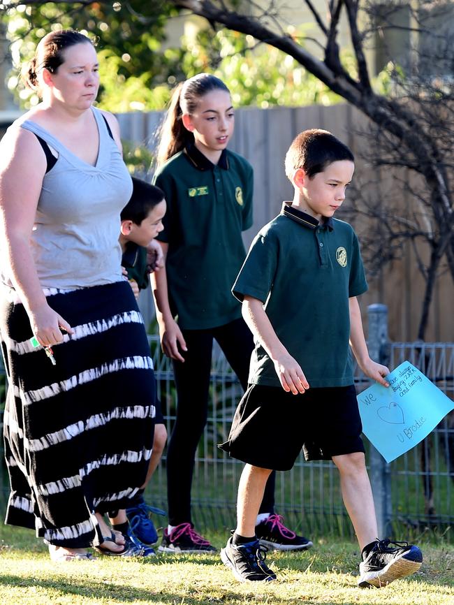 Children arrive before school to lay tributes at the Tootgarook home. Picture: Nicole Garmston