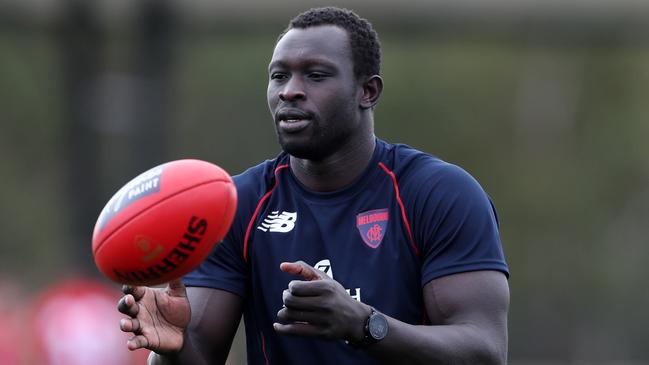 Former Melbourne Demons footballer Majak Daw backed cocaine fiend Anthony Virgato at court.