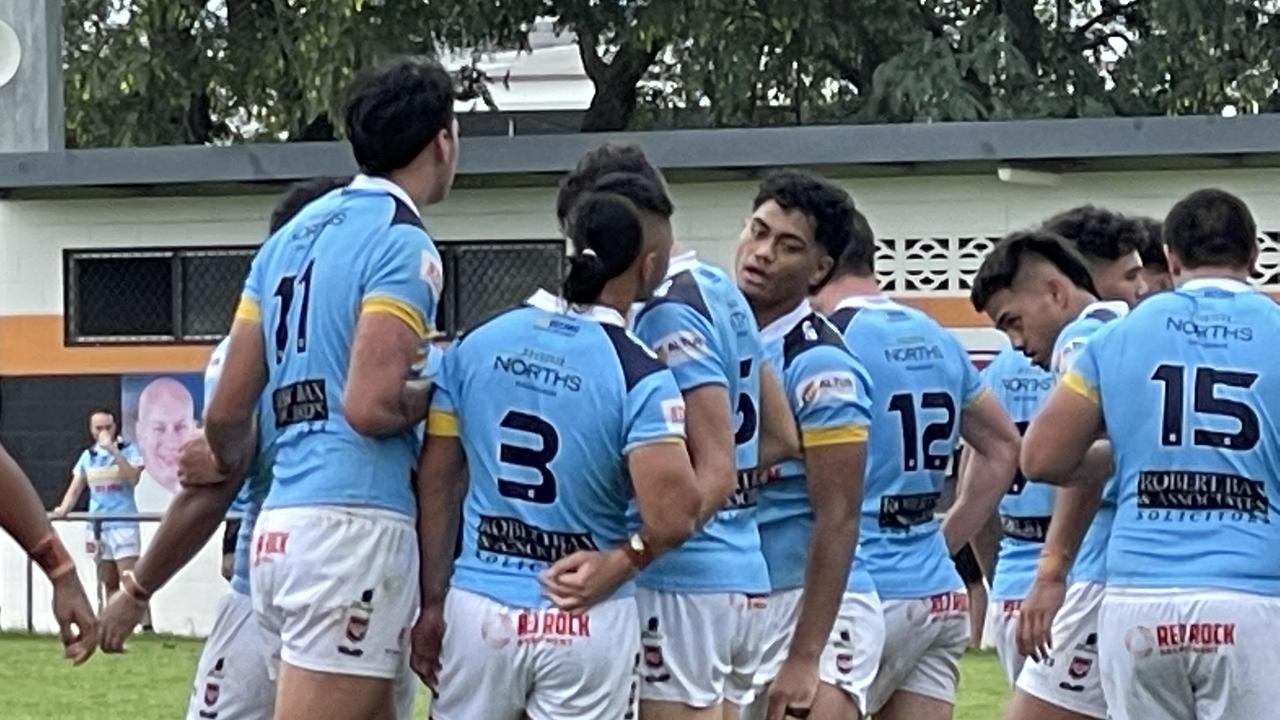 Norths Meninga Cup team celebrates a try by Karl Oloapu (middle), with Stewart in the celebration.