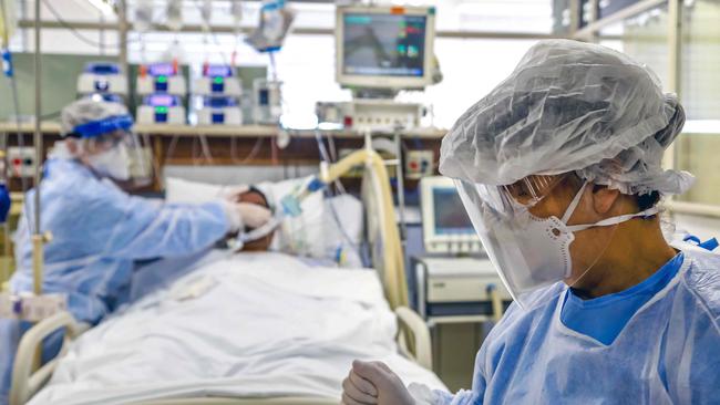 A COVID-19 patient receives treatment at the Intensive Care Unit of the Hospital de Clinicas, in Porto Alegre, Brazil. Picture: AFP