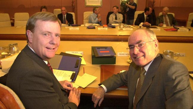 Peter Costello and John Howard attend a Federal Cabinet meeting in Canberra on February 11, 2002. Picture: File