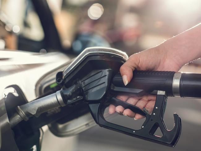 Generic photo - Petrol pump. woman pumping petrol in car at petrol station. Picture: iStock