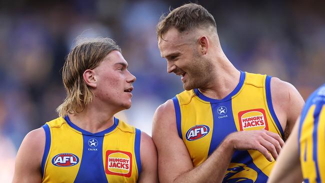 PERTH, AUSTRALIA - JUNE 01: Harley Reid and Matt Flynn of the Eagles share a moment while walking from the field at the half time break during the round 12 AFL match between West Coast Eagles and St Kilda Saints at Optus Stadium, on June 01, 2024, in Perth, Australia. (Photo by Paul Kane/Getty Images)