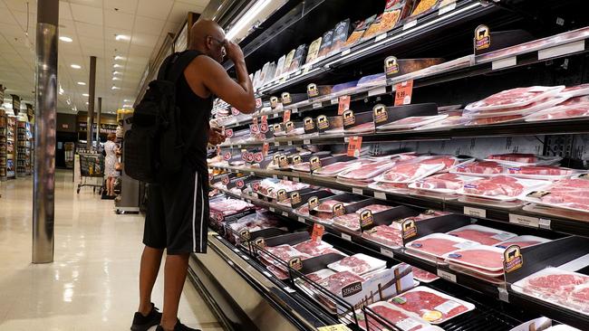 A shopper in a grocery store in Miami, Florida. Picture: Joe Raedle/AFP