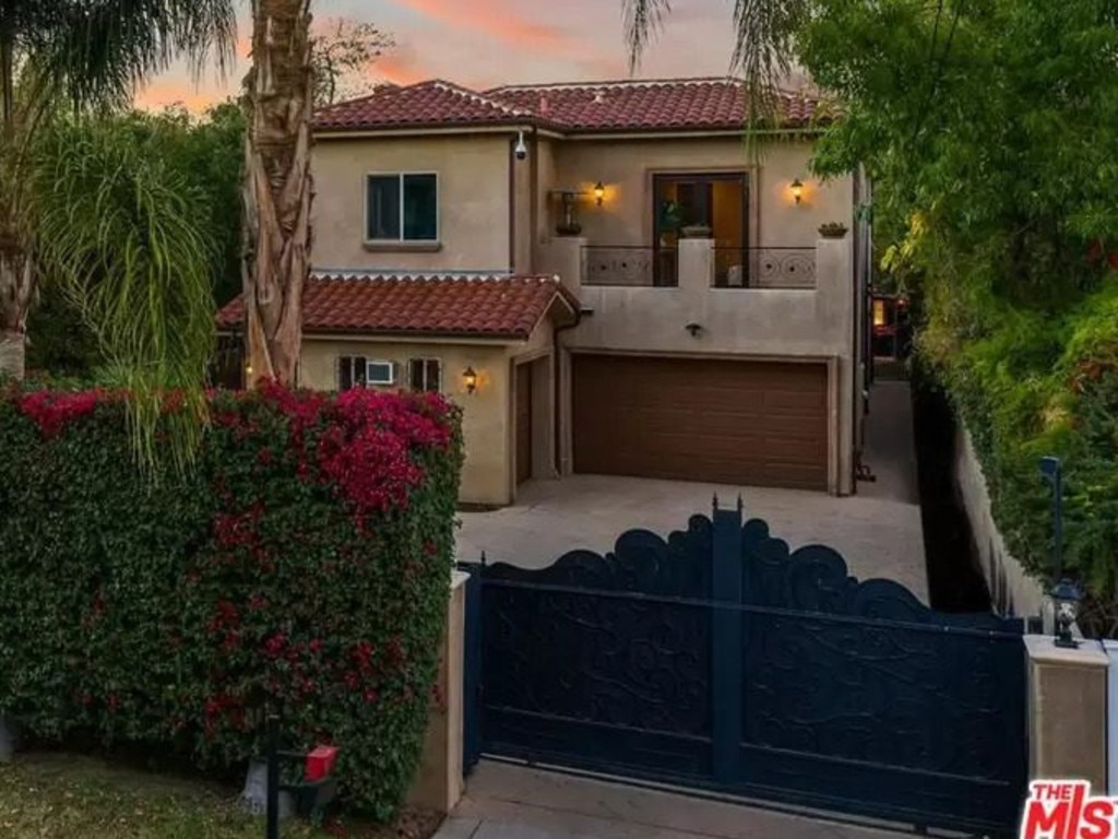 The large gates hide the home from the street. Picture: Realtor