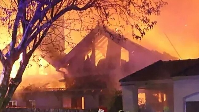 A $24 million mansion at 62 Cliff Rd in Northwood has been destroyed by a deliberately lit fire. The heritage listed home has been gutted by the fire, which police believe is the result of arson. Picture: 9 News