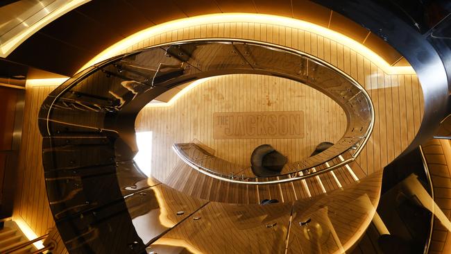 The interior staircase of the luxury yacht. Picture: Richard Dobson