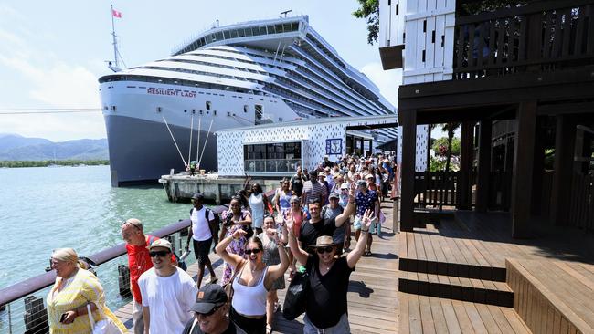 Virgin Voyages' brand new cruise ship, the Resilient Lady, has docked in Cairns for the first time. Guests from the cruise ship head to the Marlin Marina to head out to the Great Barrier Reef for the day on Reef Magic. Picture: Brendan Radke