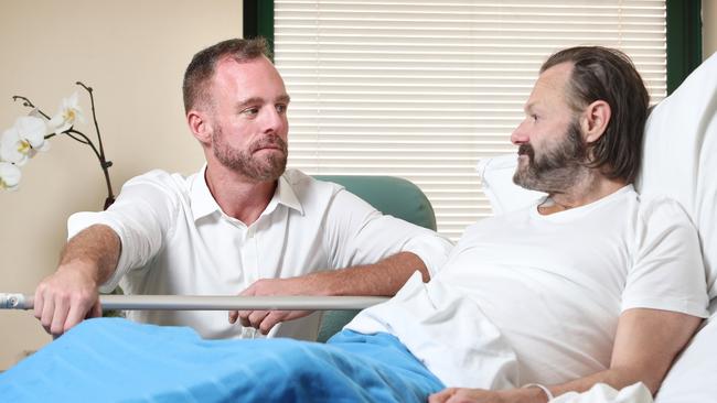 Former Australian army doctor, captain Daniel Mealey with patient Darryn Kimpton who was helped by Daniel when he was homeless. Picture: Richard Dobson