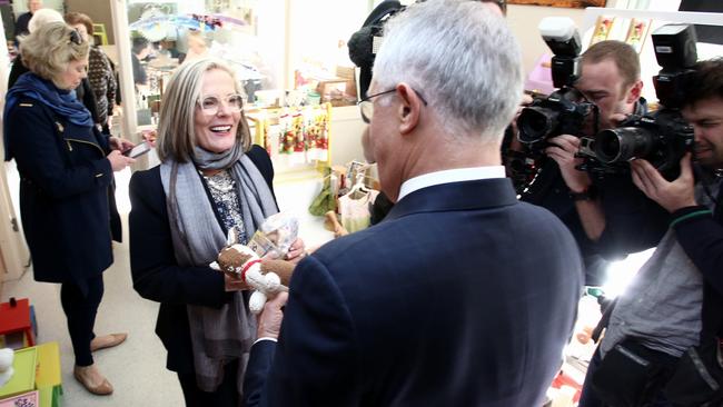 Prime Minister Malcolm Turnbull is presented with the gift by wife Lucy Turnbull today. Picture: Getty Images