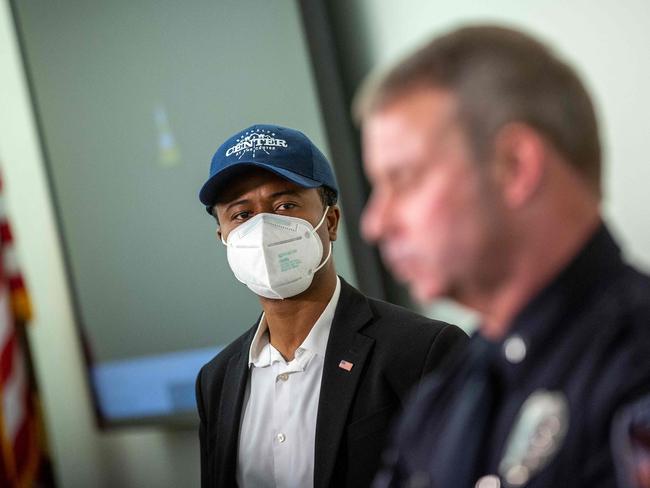 Mike Elliott (L), the new mayor of Brooklyn Center looks to Tim Gannon, Brooklyn Centre Police Chief (R) during press conference. Picture: AFP