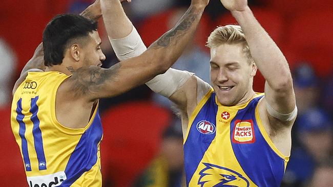 MELBOURNE, AUSTRALIA - AUGUST 20: Oscar Allen of the Eagles (R) celebrates with Tim Kelly of the Eagles after kicking a goal during the round 23 AFL match between Western Bulldogs and West Coast Eagles at Marvel Stadium, on August 20, 2023, in Melbourne, Australia. (Photo by Daniel Pockett/Getty Images)