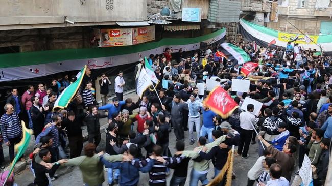 Free Syrian Army protesters marching against President Bashar Al-Assad in November 2012. Picture: Matthew VanDyke / Aletheia Films