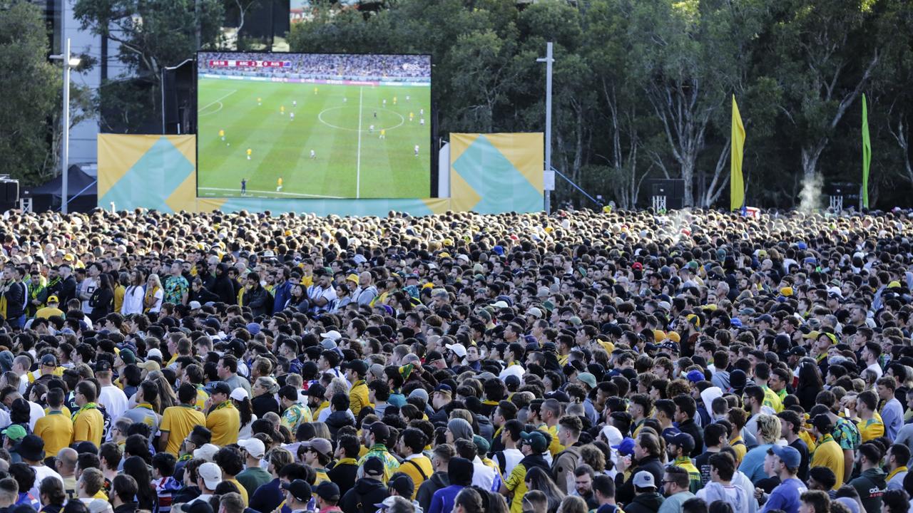 Supporters crammed live sites to watch the Socceroos play Argentina. Picture: Roni Bintang/Getty Images