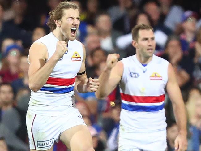 BRISBANE, AUSTRALIA - AUGUST 05:  Marcus Bontempelli of the Bulldogs celebrates a goal during the round 20 AFL match between the Brisbane Lions and the Western Bulldogs at The Gabba on August 5, 2017 in Brisbane, Australia.  (Photo by Chris Hyde/Getty Images)