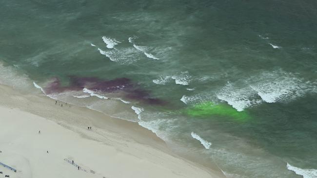 Surf Life Saving Queensland launched a new rip safety campaign and released fluoro dye into the water at Surfers Paradise to highlight rip current formations – unfortunately tides and mother nature spoiled the show. Photo: Glenn Hampson