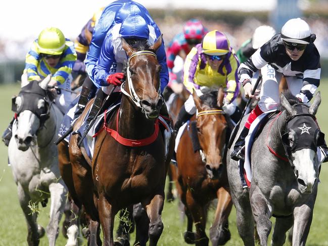 Caulfield Cup Day races at Caulfield Racecourse. Race 4, The Ethereal Stakes. Dawnie Perfect ridden by Jim Cassidy (blue cap no blinkers) charges past the field to win the 4th . Pic: Michael Klein. Saturday October 17, 2015. CaulfieldCup15