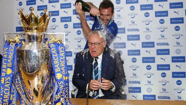 Claudio Ranieri is doused in Champagne.