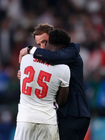 Bukayo Saka of England is consoled by Head Coach, Gareth Southgate after his penalty miss during the UEFA Euro 2020 Final. Photo: Laurence Griffiths/Getty Images
