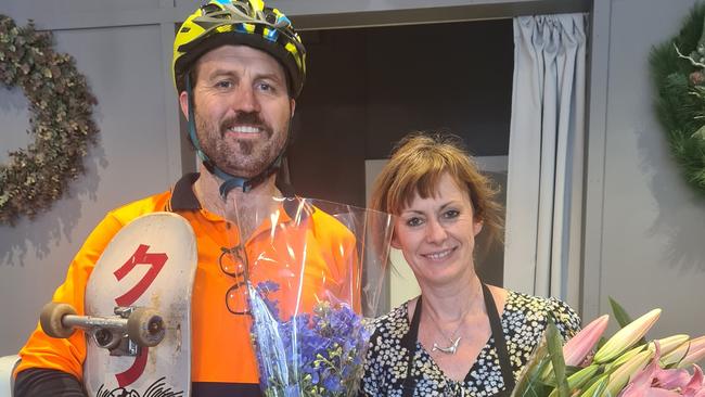 Customer Tom Martin with owner of the Little Shop of Flowers in Hyde Park, Melanie Leigh. Photo: Lucy Rutherford