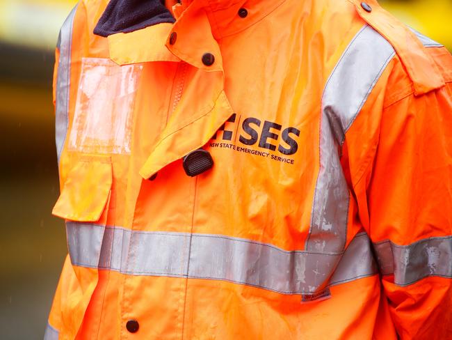 SYDNEY, AUSTRALIA - NewsWire Photos MARCH 23, 2021: Major flooding in Windsor, Sydney where the bridge has been closed. The SES Crew, Police and Fire Rescue Patrols are working together to load urgent medical supplies, food and other goods onboard the SES boats to be transported across the River to communities in need of help, in Sydney, Australia. Picture: NCA NewsWire / Gaye Gerard