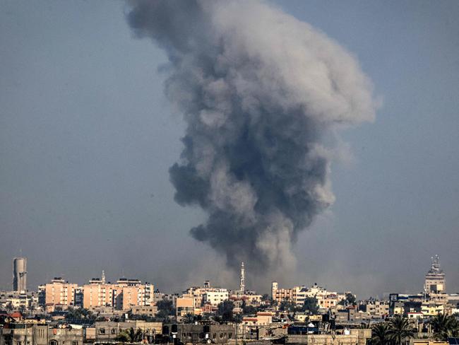 A picture taken from Rafah on January 6, 2024 shows smoke billowing over Khan Yunis in the southern Gaza Strip. Picture: AFP