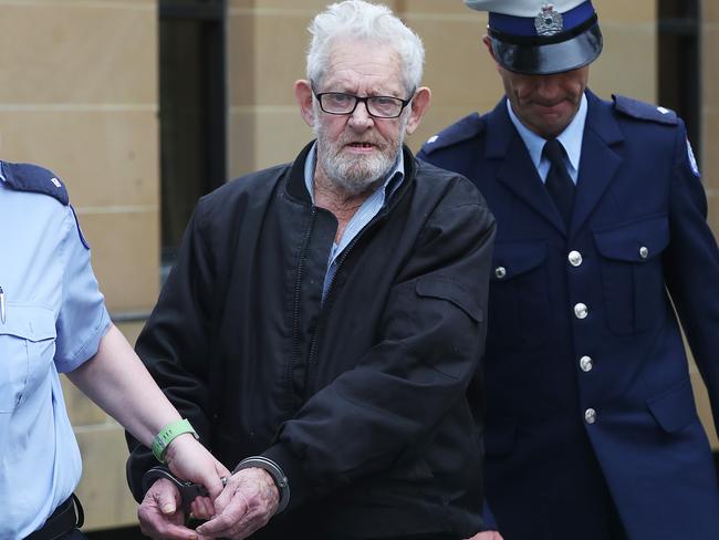 Reginald Thomas Collins is led from the court after sentencing.