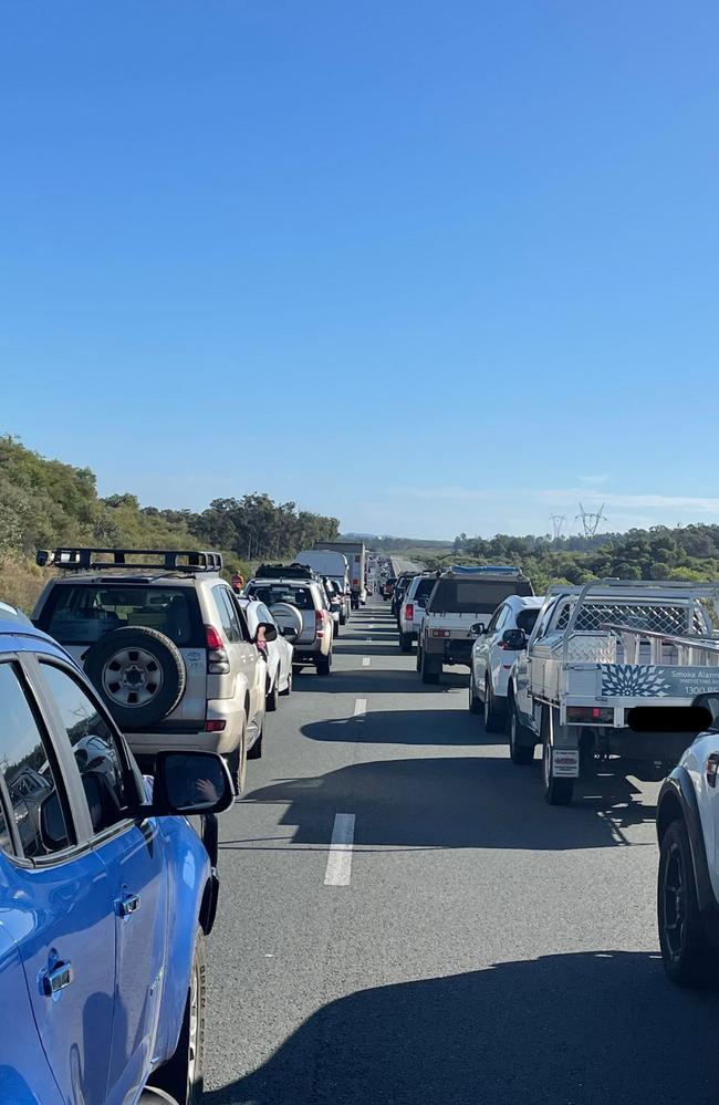 Crash at Kybong causes lengthy delays on the Bruce Highway as traffic stays at standstill.