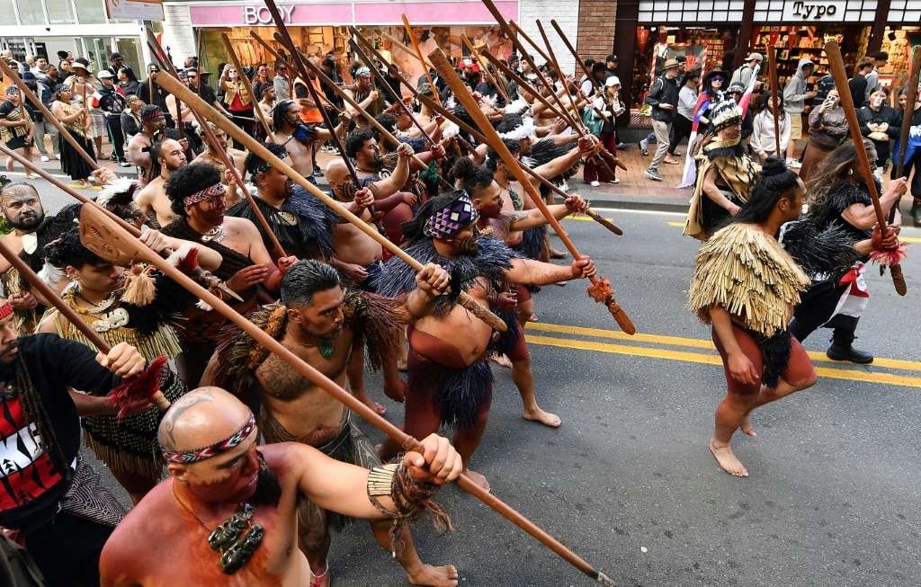 Members of the Maori community march in a protest rally to criticise the government for its policies affecting the Indigenous Māori population in Wellington on November 19, 2024.  Thousands of people participated in the nine day protest march organised by the national movement Te hīkoi mō te Tīriti (March for the Treaty) against Act’s Treaty Principles Bill plan to end after holding a rally in the Parliament ground.