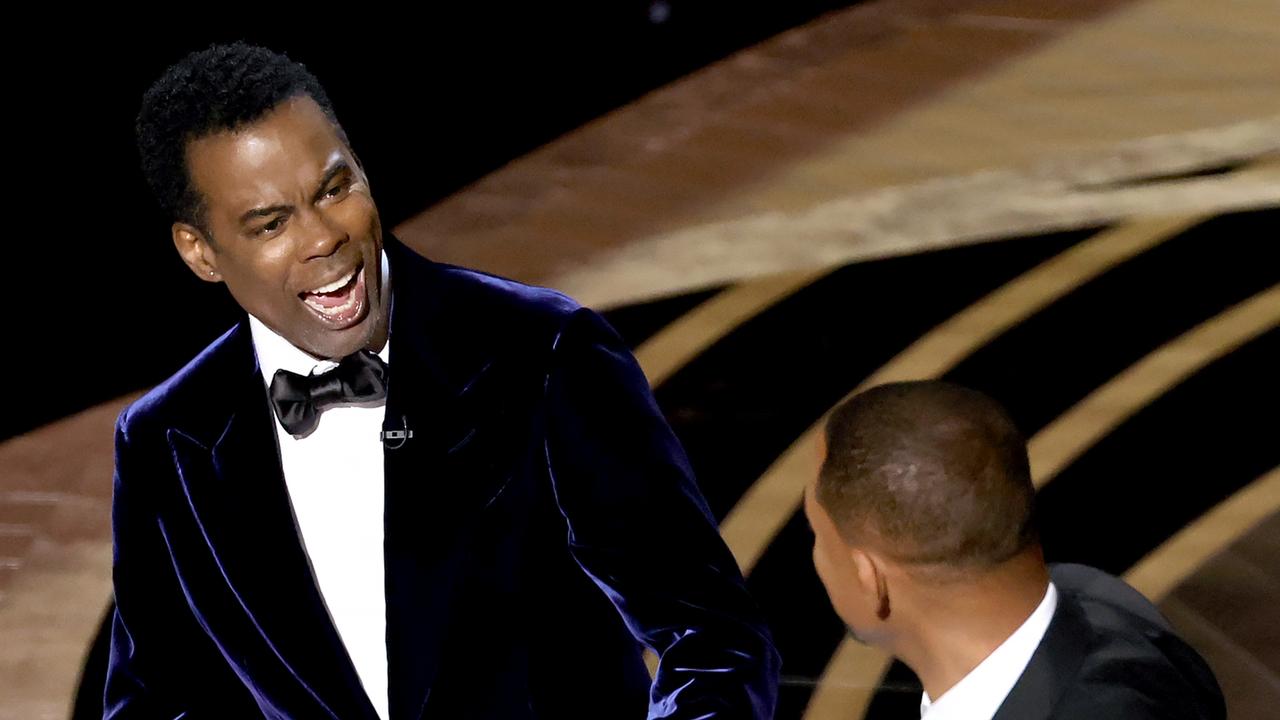 Chris Rock and Will Smith on stage during the 94th Annual Academy Awards. Picture: Getty Images