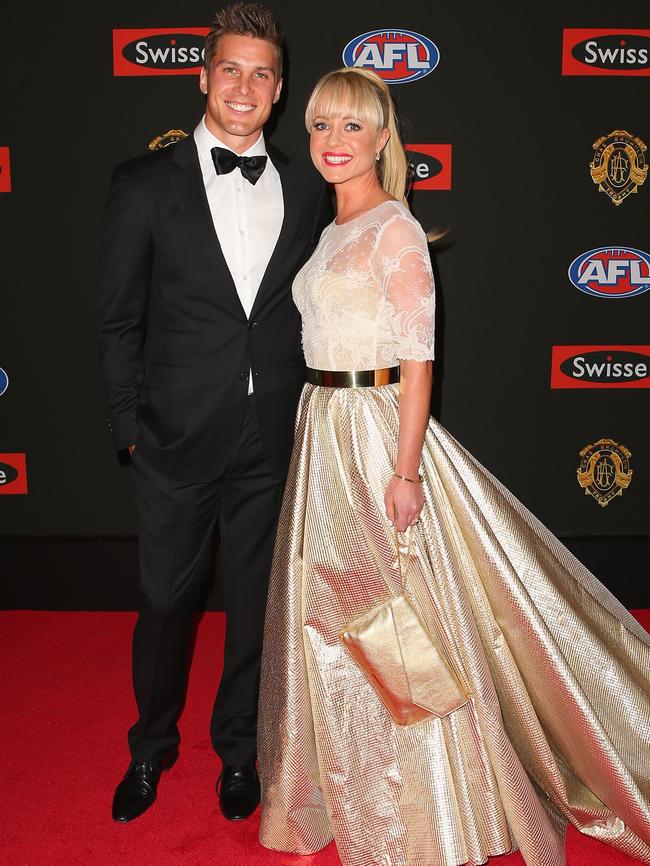 Andrew Swallow of the North Melbourne Kangaroos and his wife Elise.