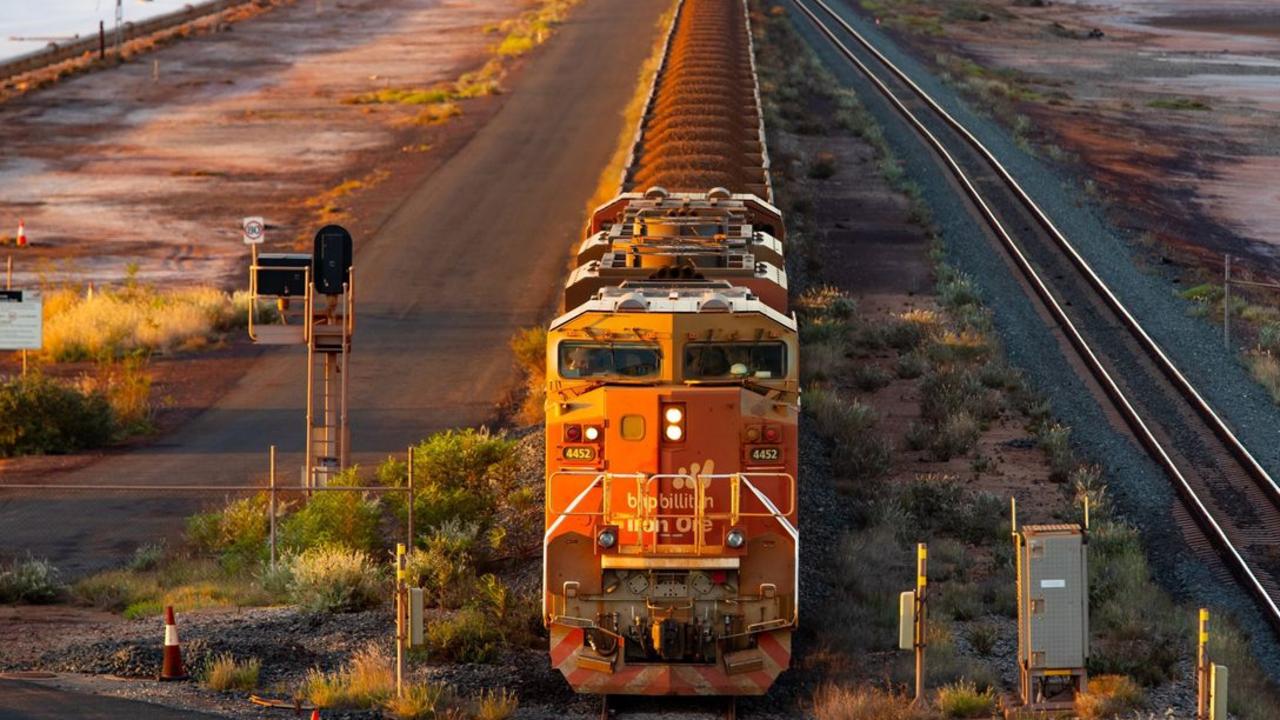 A BHP freight train carrying Australian iron ore to port. Australia ships around a third of its overall exports to China. Picture: Ian Waldie/Bloomberg News