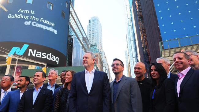 Arm Holdings CEO Rene Haas poses for a photo with members of his leadership team outside of the Nasdaq MarketSite in New York last week. Picture: Getty Images