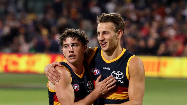 Tom Doedee (right) will be a Crow for another two years. Picture: James Elsby/AFL Photos via Getty Images