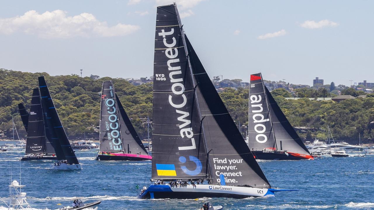 LawConnect and Andoo Comanche heading to the heads during the 2022 Sydney to Hobart. Picture: Jenny Evans/Getty Images