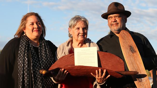 Elders Megan Davis, Pat Anderson (holding piti with Uluru Statement From The Heat inside) and Noel Pearson at the closing ceremony of the Indigenous Constitutional Convention, which agreed the Uluru Statement from the Heart. Picture: James Croucher