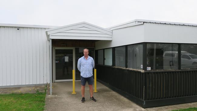 James McConvill outside the site for the supermarket.