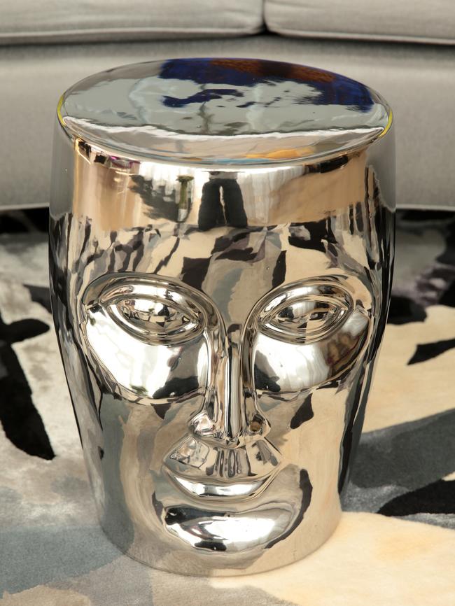 Table with face: This is so cute. I love that it’s metallic and has a face on it. My parents are quite relaxed about their furniture. Some people have lounge rooms where you can’t touch anything, but we have never been like that.