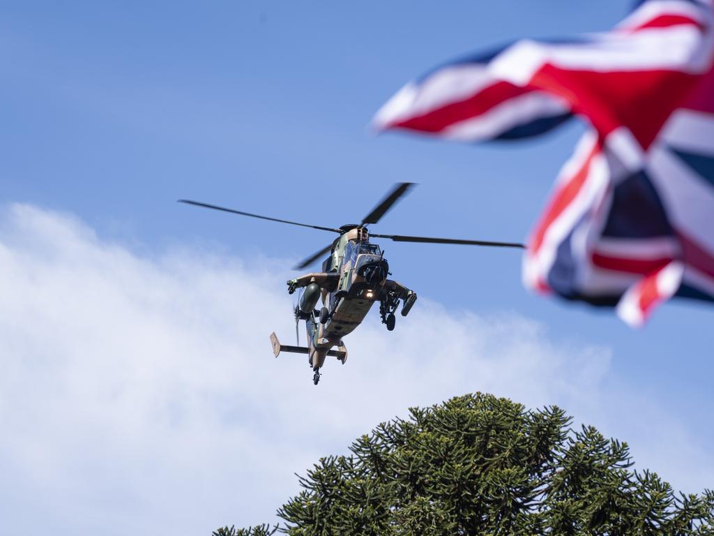 An ARH Tiger is part of a fly-past of Toowoomba's Anzac Day mid-morning service at the Mothers' Memorial, Thursday, April 25, 2024. Picture: Kevin Farmer