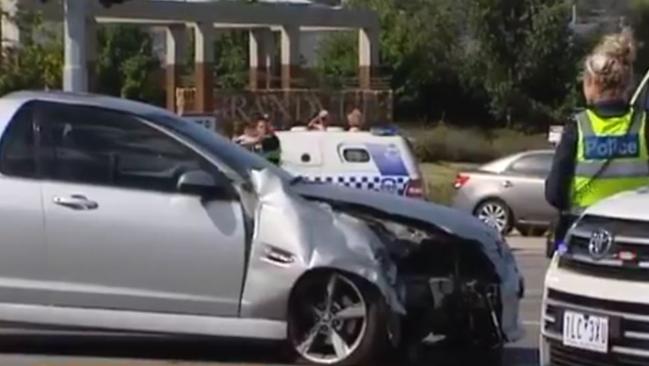 A man abandoned his ute after hitting a traffic light and eight pedestrians. Picture: Ten News