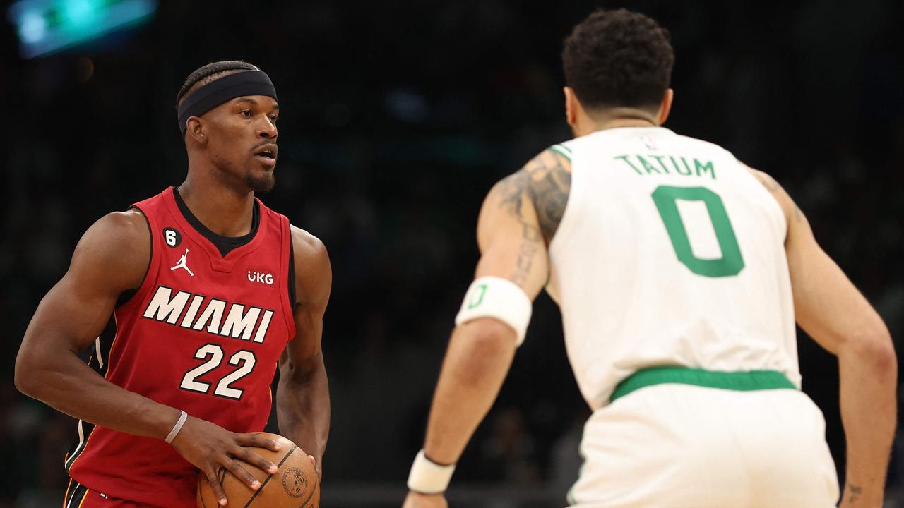 BOSTON, MASSACHUSETTS – MAY 17: Jimmy Butler #22 of the Miami Heat is defended by Jayson Tatum #0 of the Boston Celtics during the third quarter of game one of the Eastern Conference Finals at TD Garden on May 17, 2023 in Boston, Massachusetts. NOTE TO USER: User expressly acknowledges and agrees that, by downloading and or using this photograph, User is consenting to the terms and conditions of the Getty Images License Agreement. Adam Glanzman/Getty Images/AFP (Photo by Adam Glanzman / GETTY IMAGES NORTH AMERICA / Getty Images via AFP)